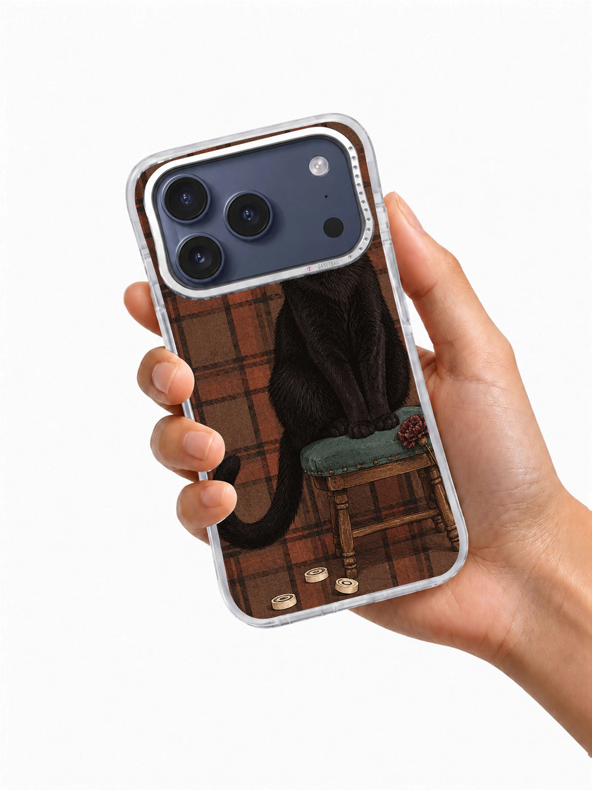 Hand holding The Black Cat’s Paper Crown artwork iPhone 17 Pro case