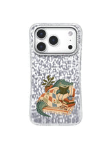 Crocodile pausing over a storybook bridge decision in a warm cottagecore phone case illustration.