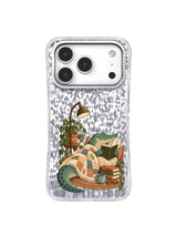 Front view of the transparent iPhone 17 Pro case with the Blanket Chapter crocodile artwork.