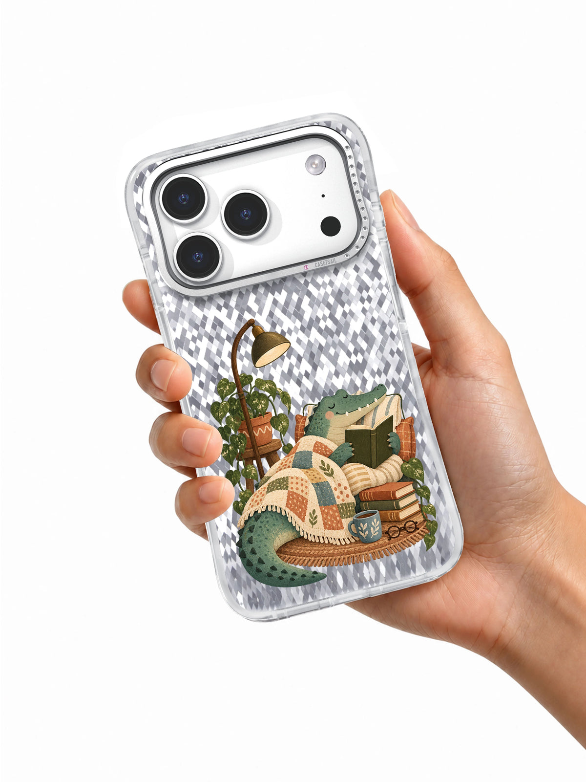 Transparent Blanket Chapter iPhone 17 Pro case held in one hand.