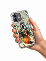 Blooming Bone Conservatory iPhone case held in hand