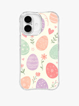Blossom Heart Easter Celebration: Mercan kalpler ve sade yeşil dallarla iri pembe, şeftali, nane ve lavanta yumurtalar.