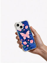 Blue Butterfly Garden iPhone 14 case hand view