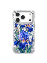 First Rise pattern with cobalt and lavender irises, coral-orange centers, and teal leaves on an iPhone 17 Pro case