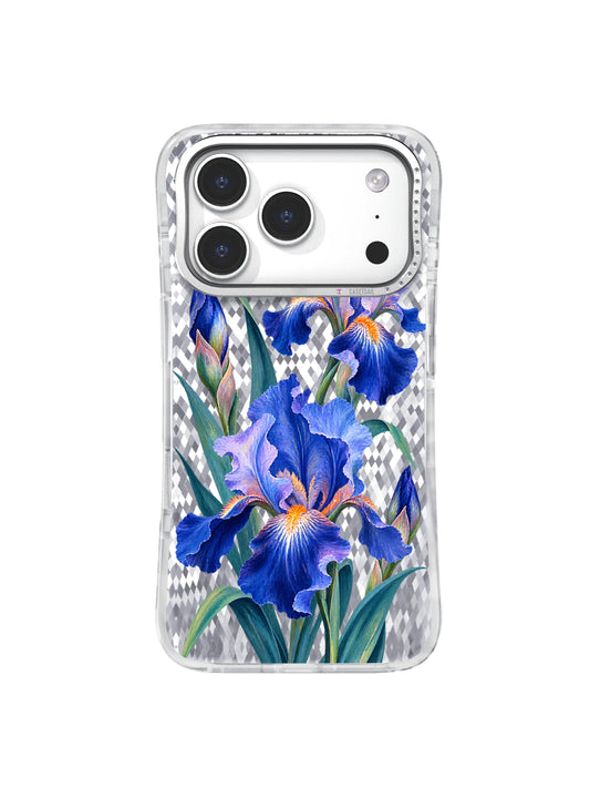 First Rise pattern with cobalt and lavender irises, coral-orange centers, and teal leaves on an iPhone 17 Pro case