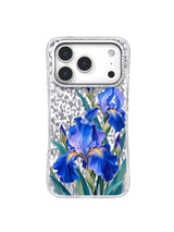 Lavender Turn pattern with a pale violet iris above a deep cobalt bloom and upright teal leaves on an iPhone 17 Pro case