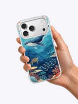 The Blue Passage ocean iPhone case held in hand