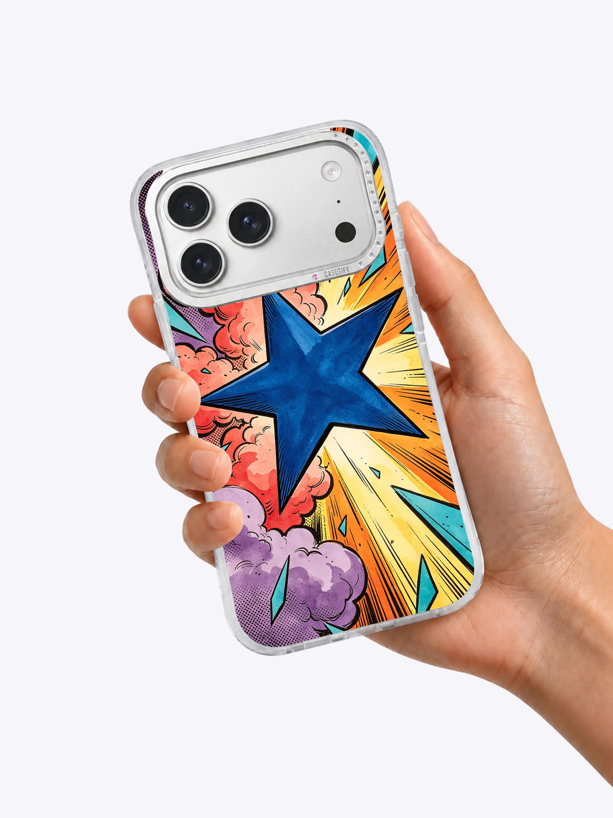 Hand holding the Blue Star Impact comic blue star iPhone case