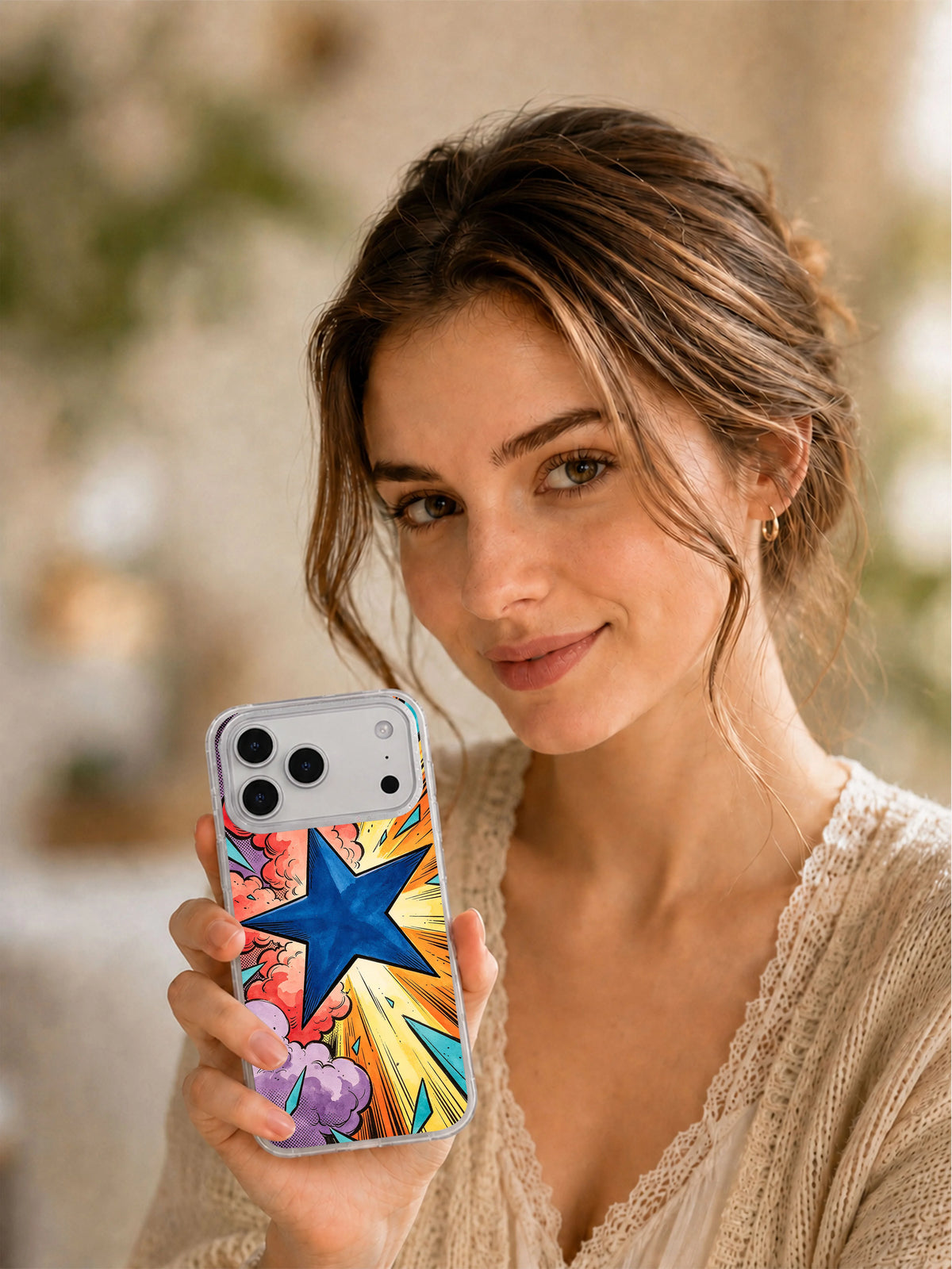 Lifestyle view of a person holding the Blue Star Impact cobalt star iPhone case