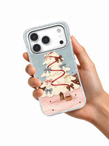 Blush Bow Snow Tree iPhone 17 Pro case handheld view