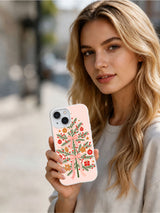 Bow and Berry Holiday Merry Vellum iPhone case lifestyle view