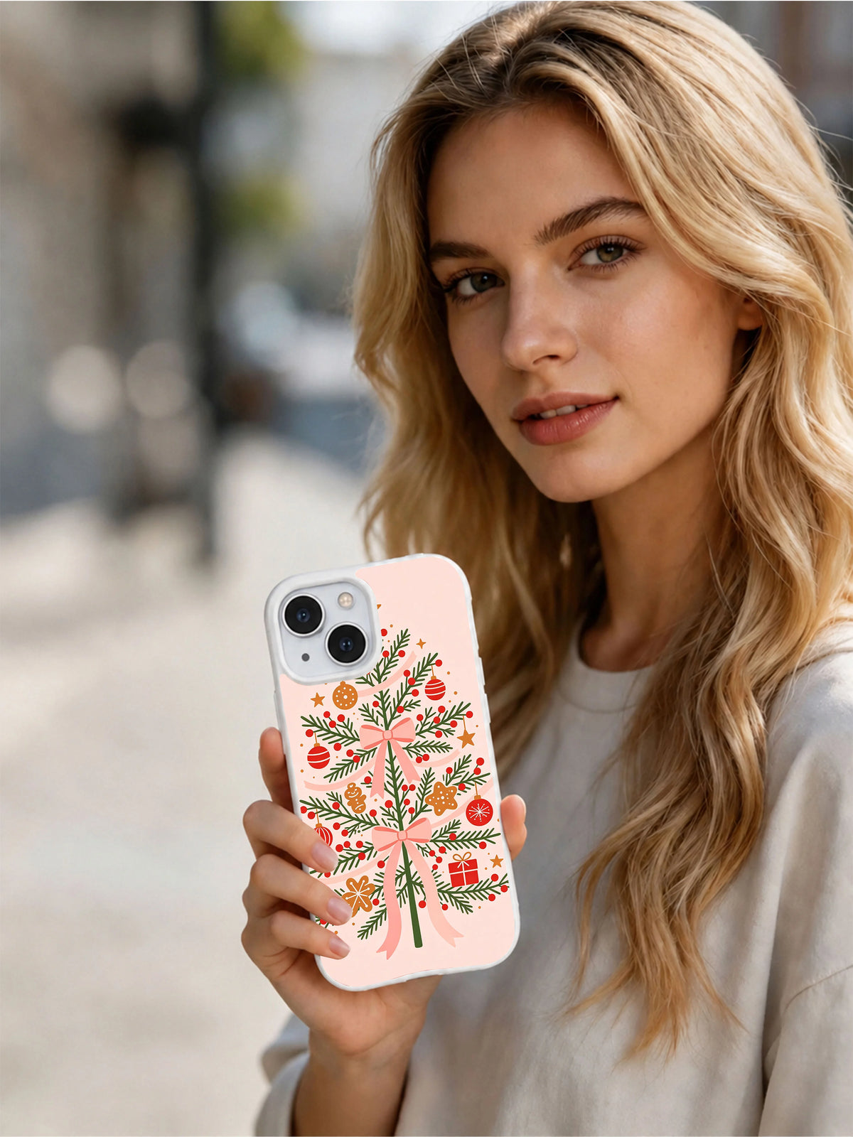 Bow and Berry Holiday Merry Vellum iPhone case lifestyle view