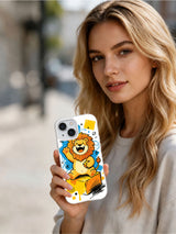 Lifestyle view of a woman holding the Brave Little Lion iPhone 13 case