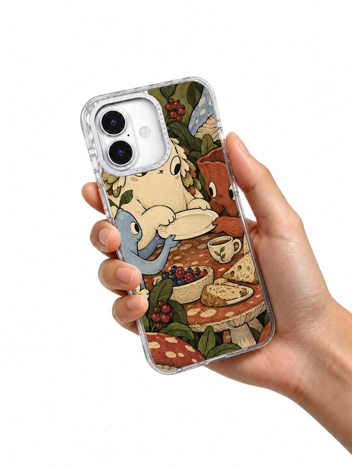 Breakfast Under the Mushroom Table iPhone 17 case held in hand