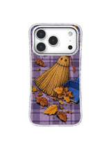 Golden broom resting on pale purple checks iPhone 17 Pro case pattern four