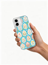 Bunny Garden Without Bunny: Hand holding the case with its illustrated back facing outward.