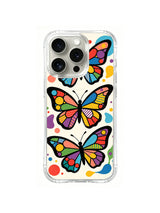 Geometric Wing Trio: Three large butterflies carry bold geometric rainbow wing panels.