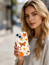 Butterfly Harvest Meadow: Person holding the illustrated case in an outdoor portrait.