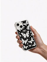 Hand holding Vesper Wraith Butterfly of the Hollow Night iPhone 15 Plus case