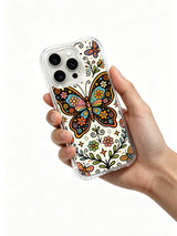 Butterfly Melody floral iPhone 14 Pro case held in hand