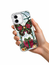 Butterfly Ornament Conservatory iPhone 17 case held in hand