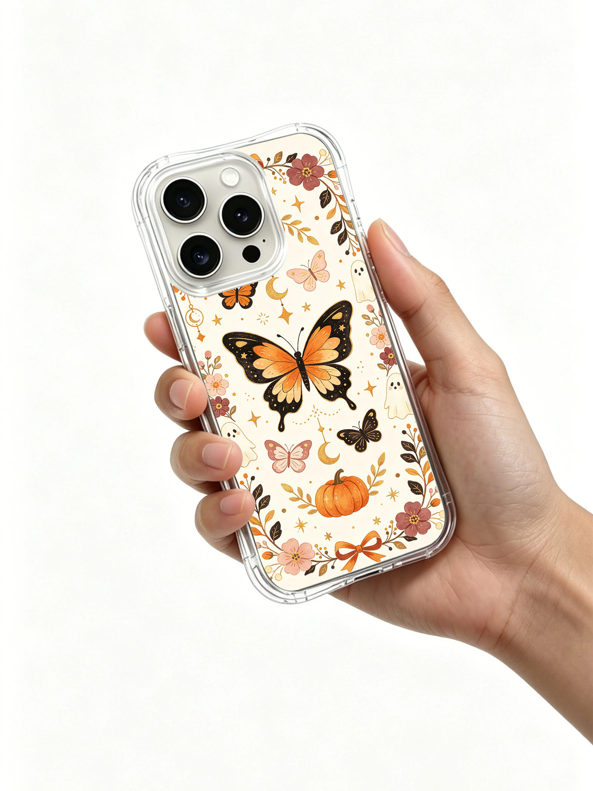 Butterfly Spell Harvest iPhone 14 Pro case held in hand