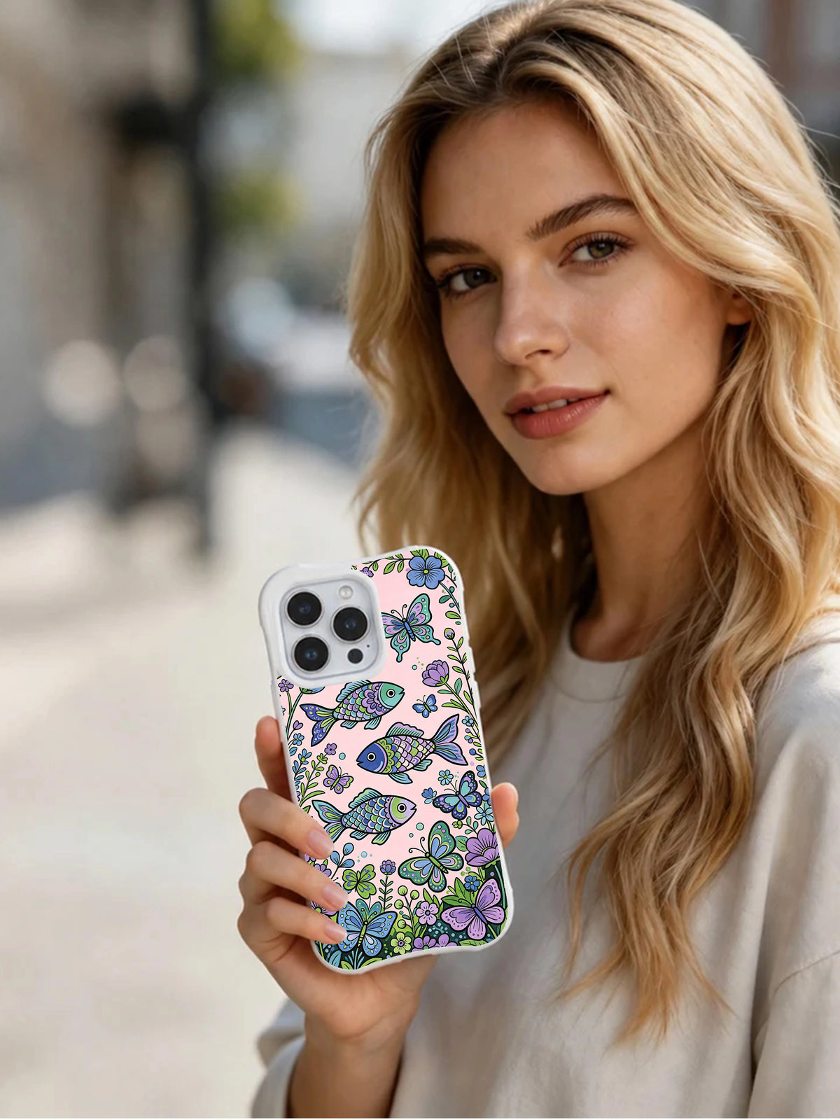 Butterfly Valley Guardian Fish iPhone 14 Pro case – lifestyle view
