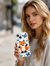 Lifestyle view of a woman holding the Butterfly Wink Fox iPhone 13 case