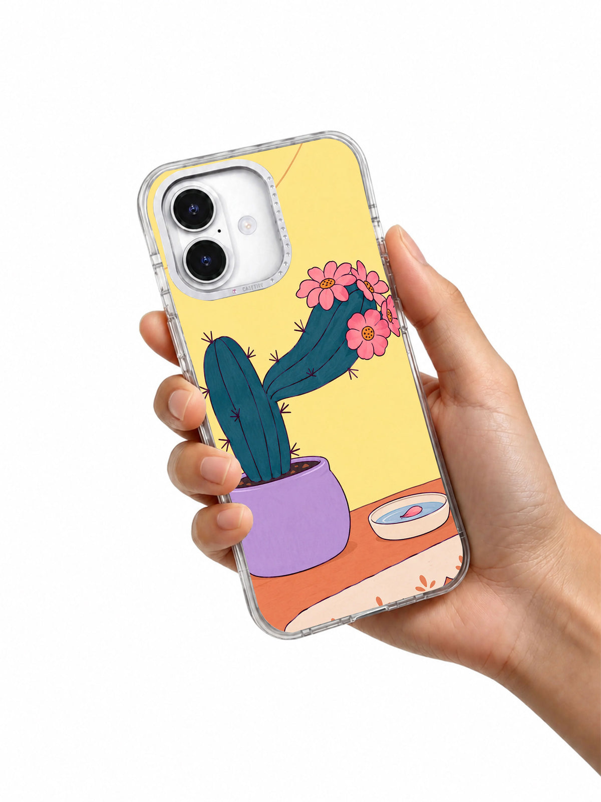 Hand holding A Cactus Borrows a Collar artwork on a transparent iPhone case