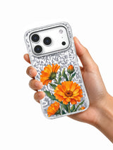 Calendula Constellation transparent iPhone case held in hand