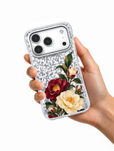 Camellias Keep Watch transparent iPhone 17 Pro case held in hand
