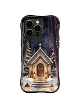 Old gold forest chapel with wreath and gifts on a black iPhone 16 Pro case