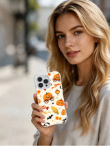 Candy Corn Lantern Waltz iPhone 14 Pro case held in hand