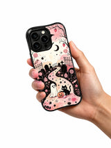 Pink gothic ghost phone case held in hand