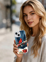 Person holding the Cardinal Christmas Garden iPhone 14 case