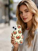 Cardinal Winter Garden iPhone 15 case shown in a winter lifestyle scene