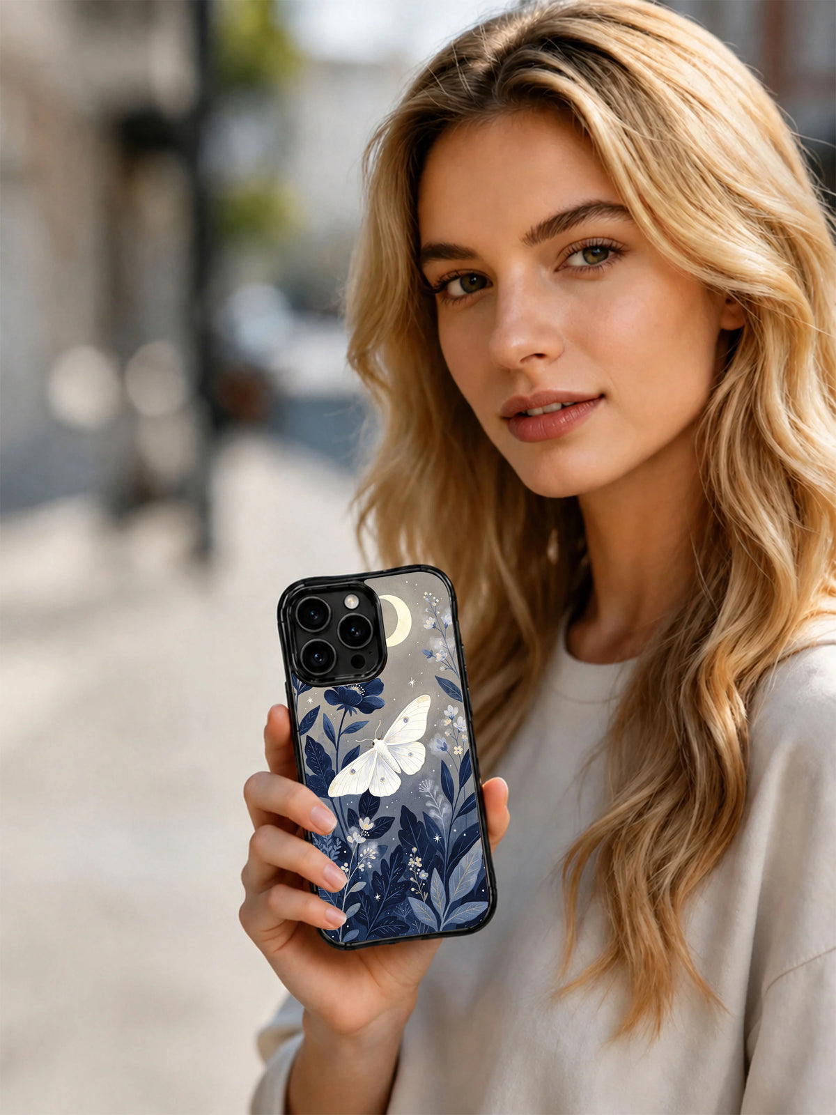 The Quiet Wilds moth and moon phone case