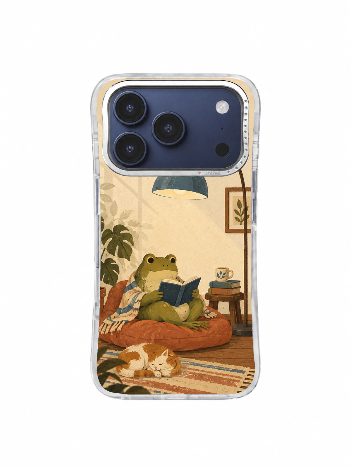 Calm reading nook with frog and books iPhone case artwork