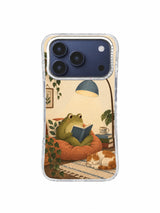 Frog reading on a rust cushion illustrated phone case