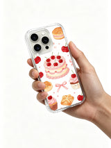 Cherry Birthday Garden: Hand holding the case with its illustrated back facing outward.
