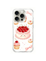 Cherry Birthday Garden / Smiling Cherry Cake: A smiling pink cake piled with red cherries, with cookies, a cupcake and ribbon bows nearby.
