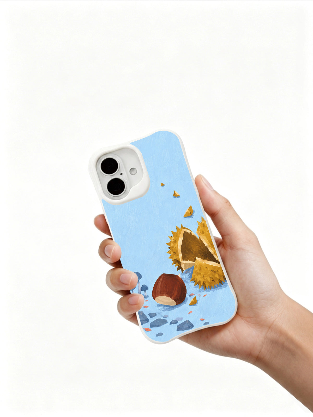 Hand holding a white iPhone 16 case with chestnut and mushroom artwork