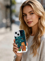 Person holding the Christmas Bear and Gift Tree iPhone 14 case