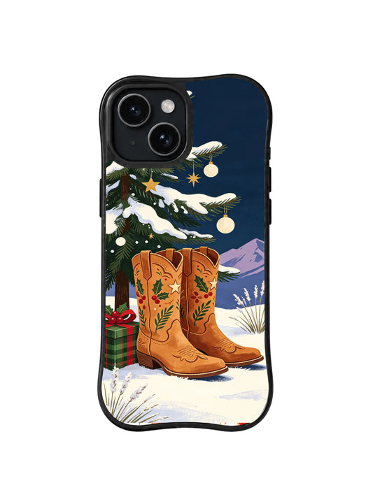 Warm tan embroidered cowgirl boots beneath a snowy pine iPhone 14 case, pattern one