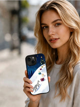 Person holding the Christmas fox and starry gift hill iPhone 14 case