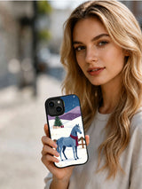 Person holding the Christmas horse of the northern hills iPhone 14 case