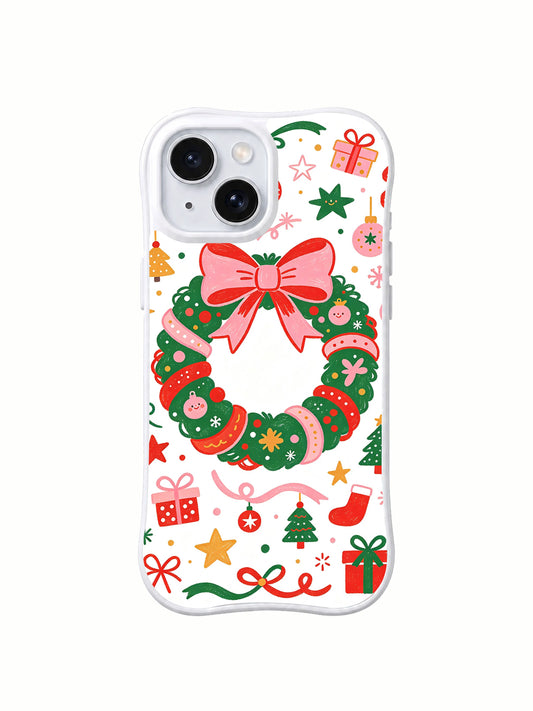 Christmas Ribbon Wonderland: Ortası açık, yuvarlak desenli parçalardan oluşan çelenk ve üstte pembe fiyonk.