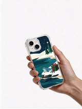 Hand holding the Christmas seal at Evergreen Cove iPhone 14 case