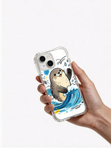 Coastal Smile Seal iPhone 13 case shown in a blue ocean-themed product scene