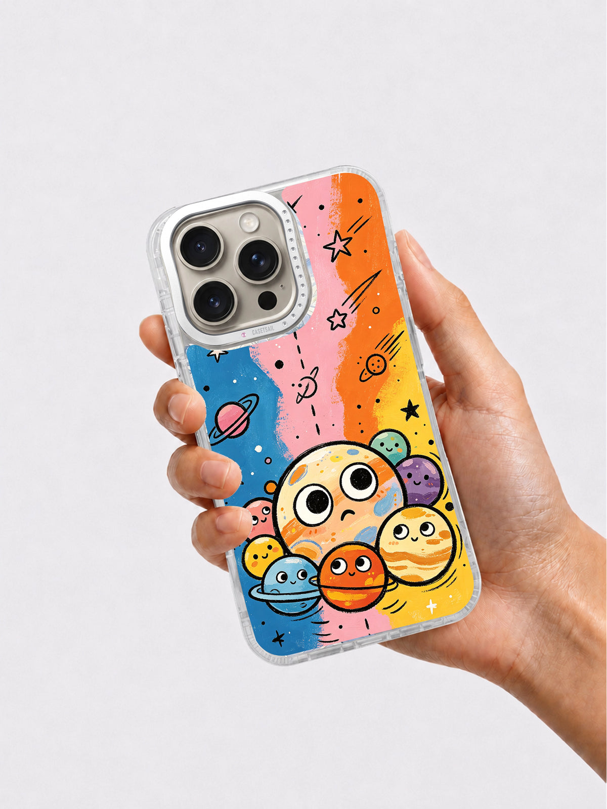 Colorful celestial iPhone 15 Pro Max case held in hand